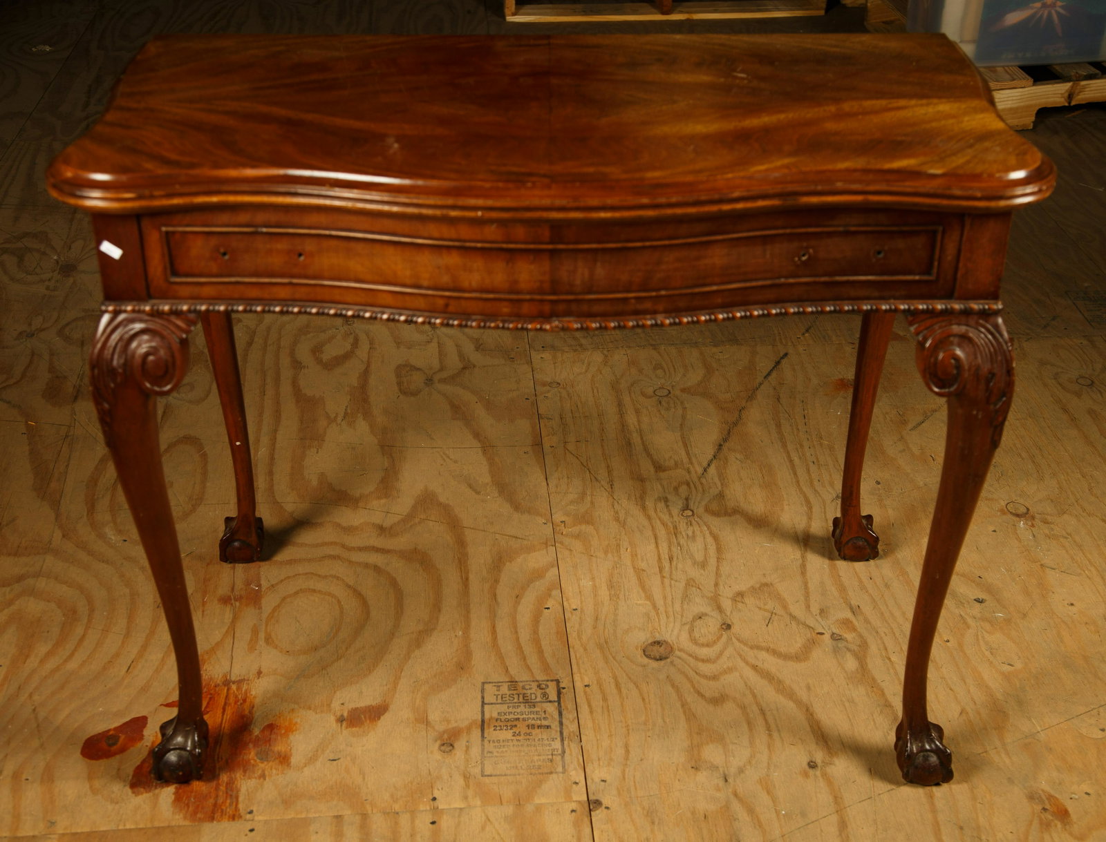 Chippendale Style Banquet Table w/ Drop Leaf: Mahogany with serpentine front and drop leaves. It measures 30 1/2" H x 40" W x 21"D (closed). Table has extensions but leaves missing and drop leaf detached. Furniture Pick-up Availability-We will ha