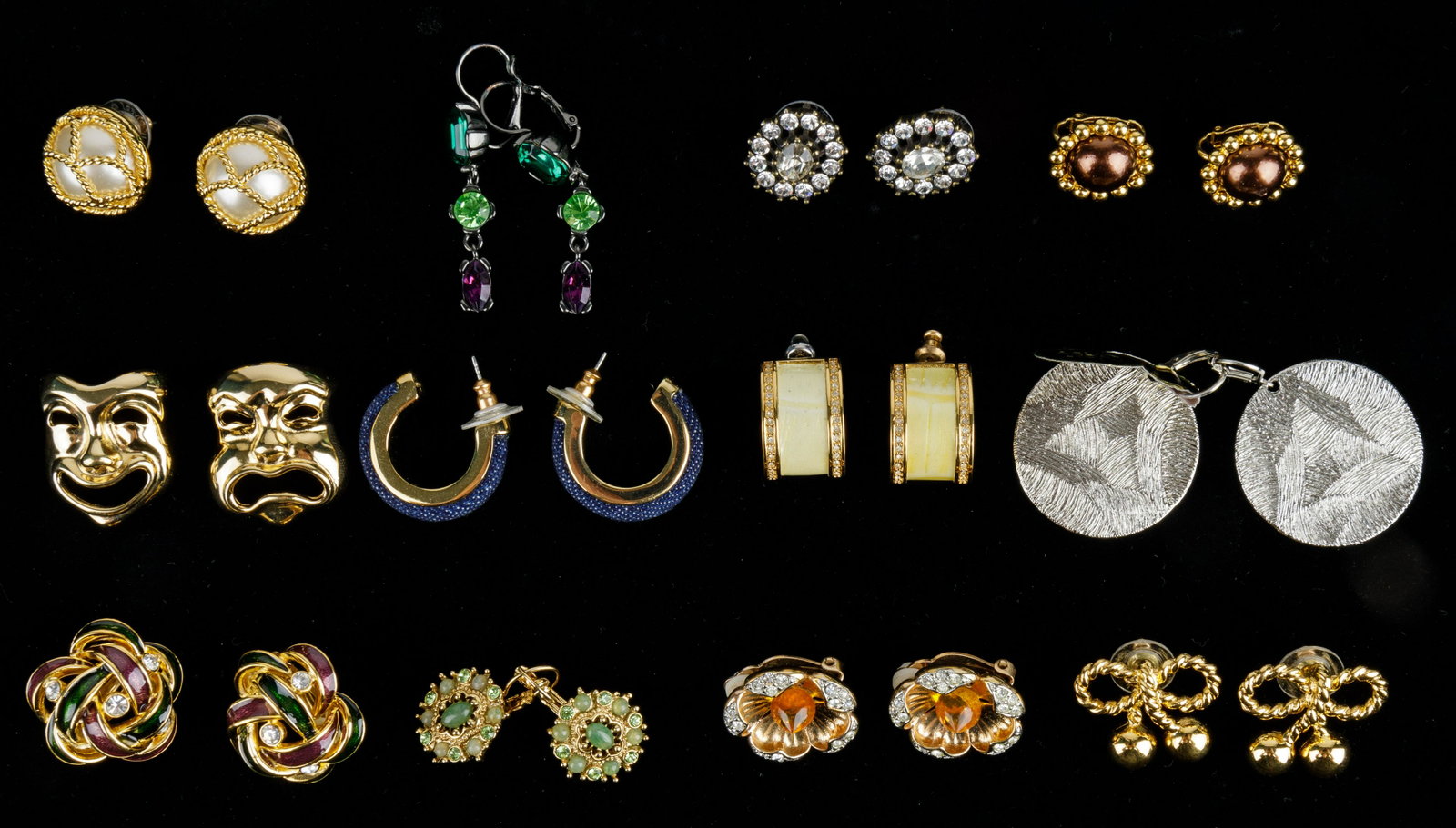 Joan Rivers Earrings (12 Pairs): Lot of 12 pairs of Joan Rivers earring pairs in various styles including hoops, dangle, silver tone, gold tone, theatrical and more.