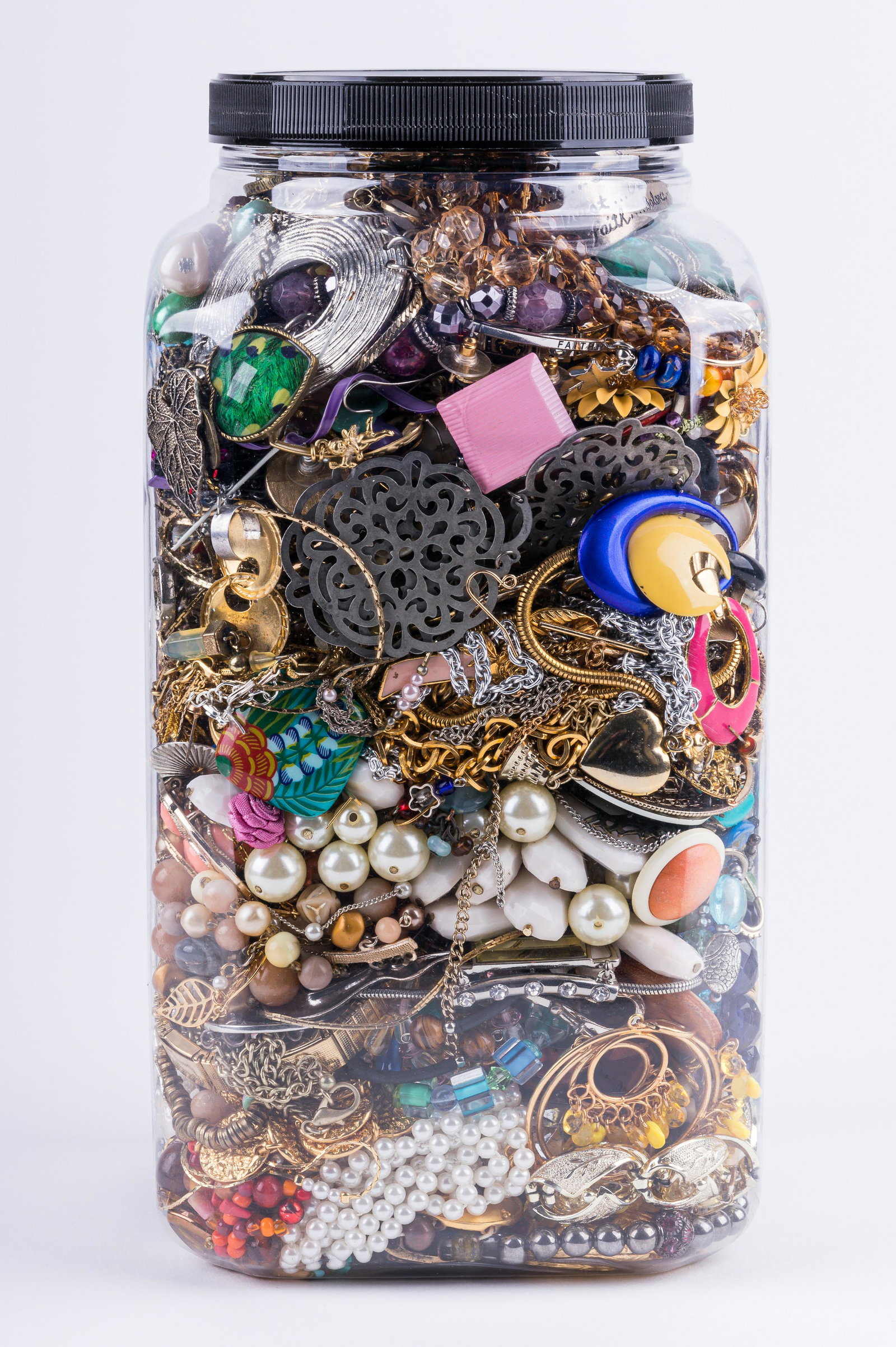 11 Pounds of Craft/ Costume Jewelry: A plastic snack container with 11 pounds of jewelry including pins, earrings, necklaces, and bracelets.