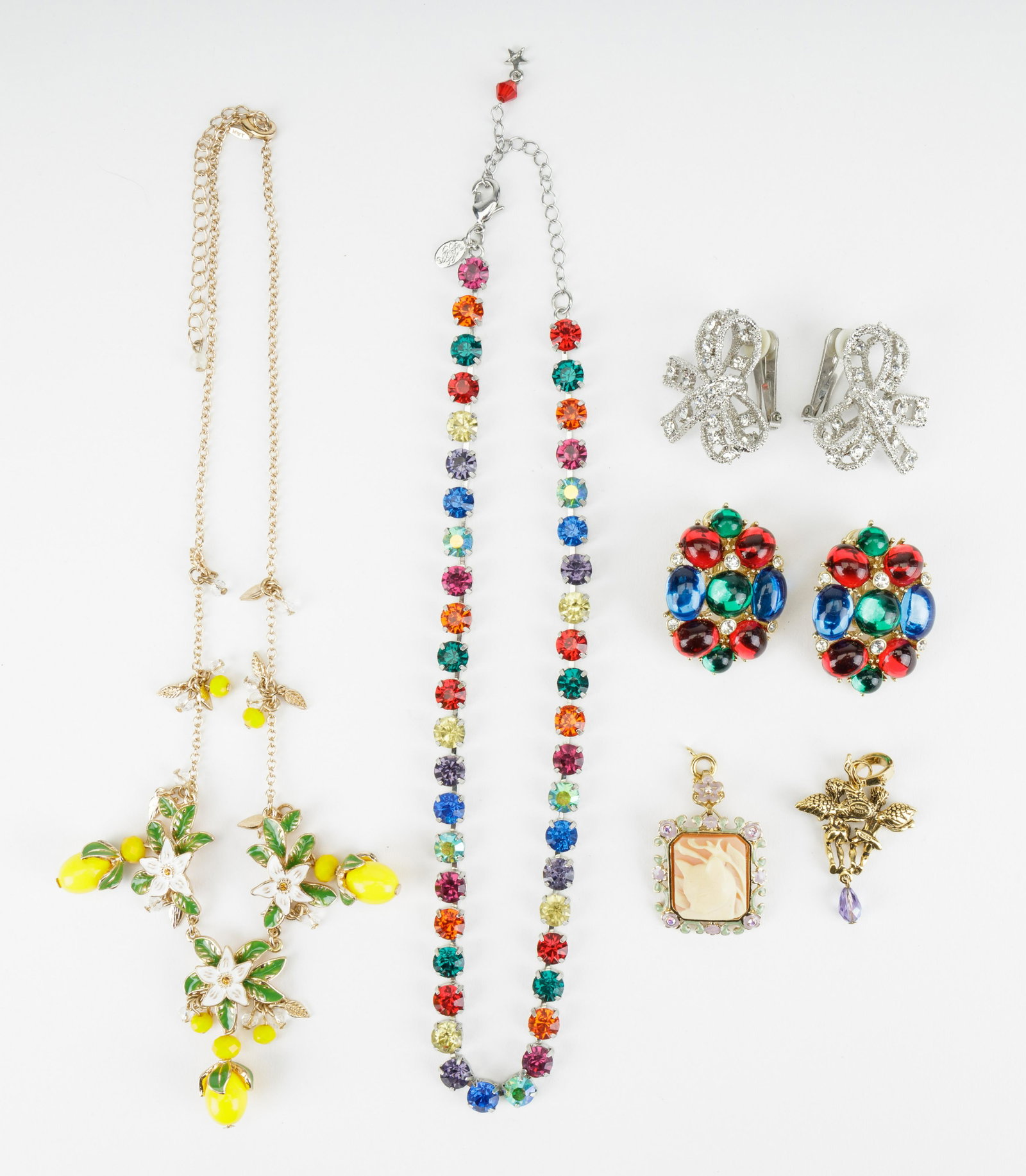 Scaasi, Kirks Folly & Vintage Jewelry: Two pairs of show stopping large Scaasi designer earrings, Kirks Folly necklace with two charms, and lemon fruit bright yellow necklace.