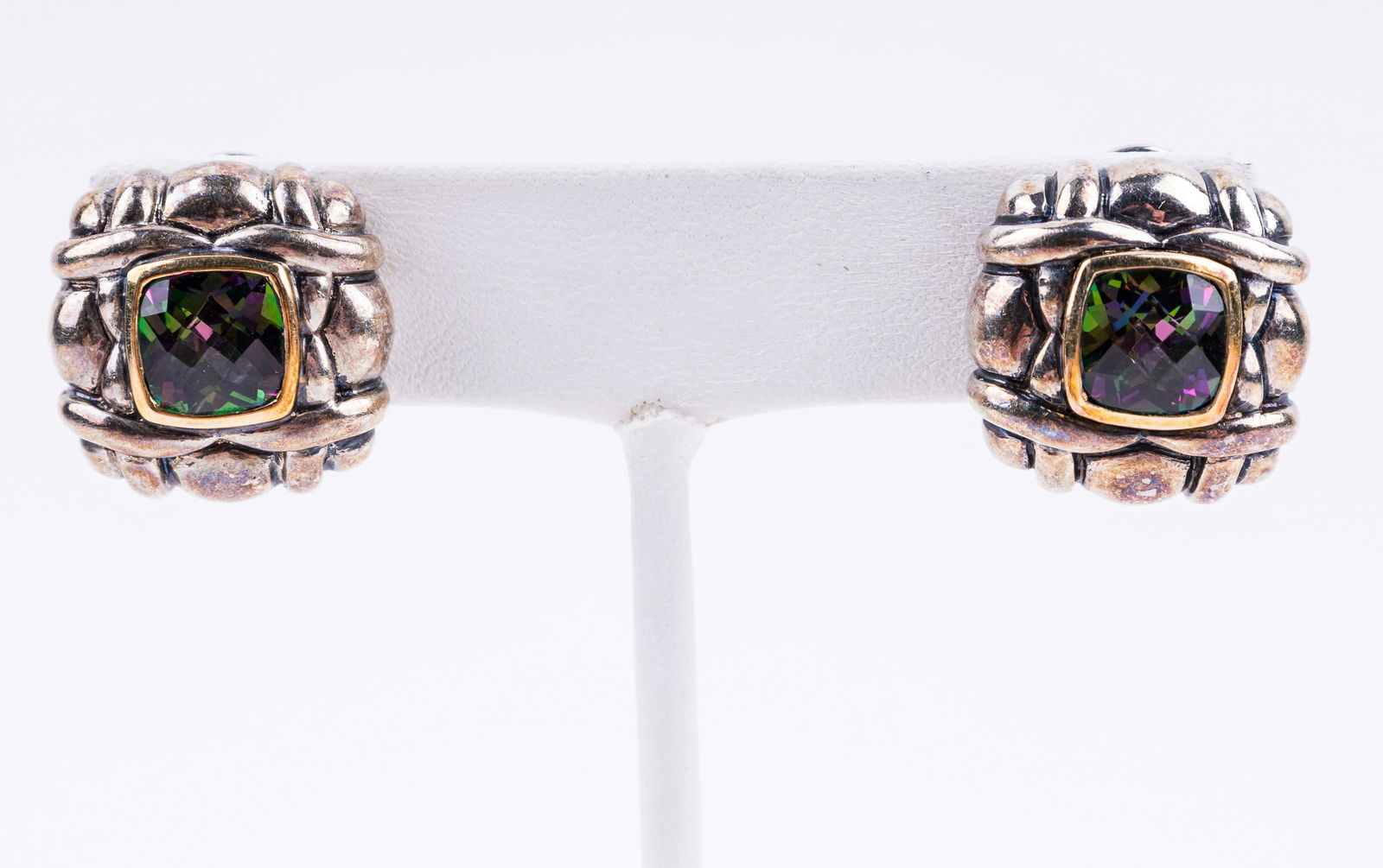 14K Gold & Sterling Silver Mystic Topaz Earrings: Pair of earrings marked 14K gold and 925 sterling silver, marked "BJC" holding a central mystic topaz stone (approx 3/4 ctw) . Each earring measures approx 6/8" square. Total weight approx 15.0g.