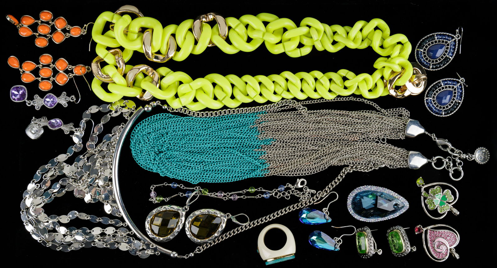 Costume Jewelry: Lot of colorful costume jewelry includes a white ring with blue drusy that tests in the range of jade (size 5.5), six pairs of pierced earrings, three necklaces, anklet, and three pendants.