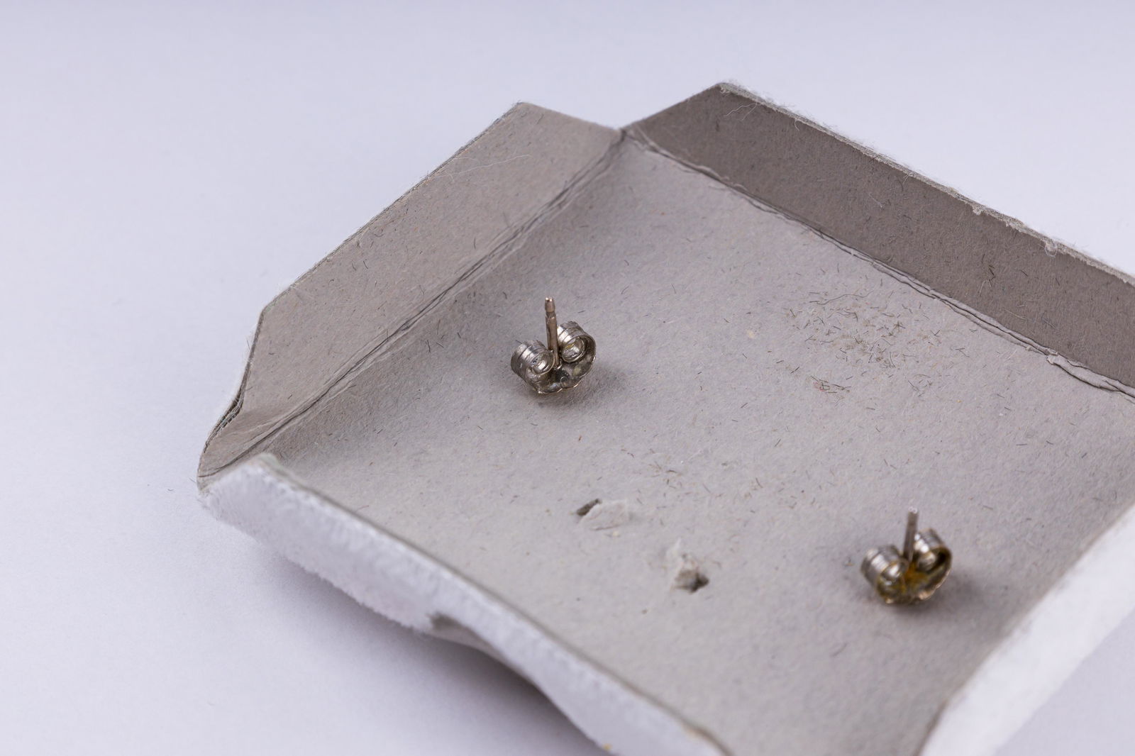 14K Gold Diamond Stud Earrings: 14K white gold stud earrings. Each diamond approx .07 ctw.