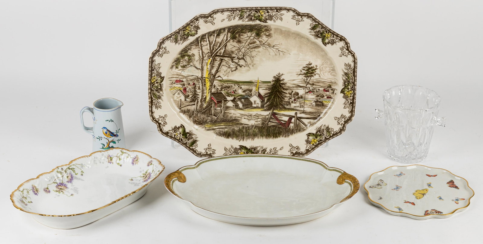 Limoges, Spode & More: Johnson Brothers charger (approx 20" L), Haviland Limoges charger with gilded handles (approx 18" L), Limoges France shallow bow (approx 16" L), Limoges butterfly gilded edge plate (10.5" dia), Copela