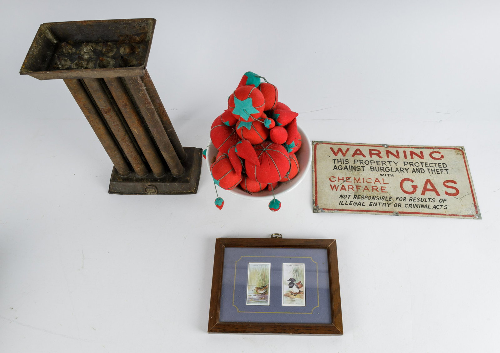 19th Century Candle Mold and More: Lot includes 19th C candle mold, original British Player cigarette cards, custom antique pin cushion and warning sign mentioning chemical warfare.