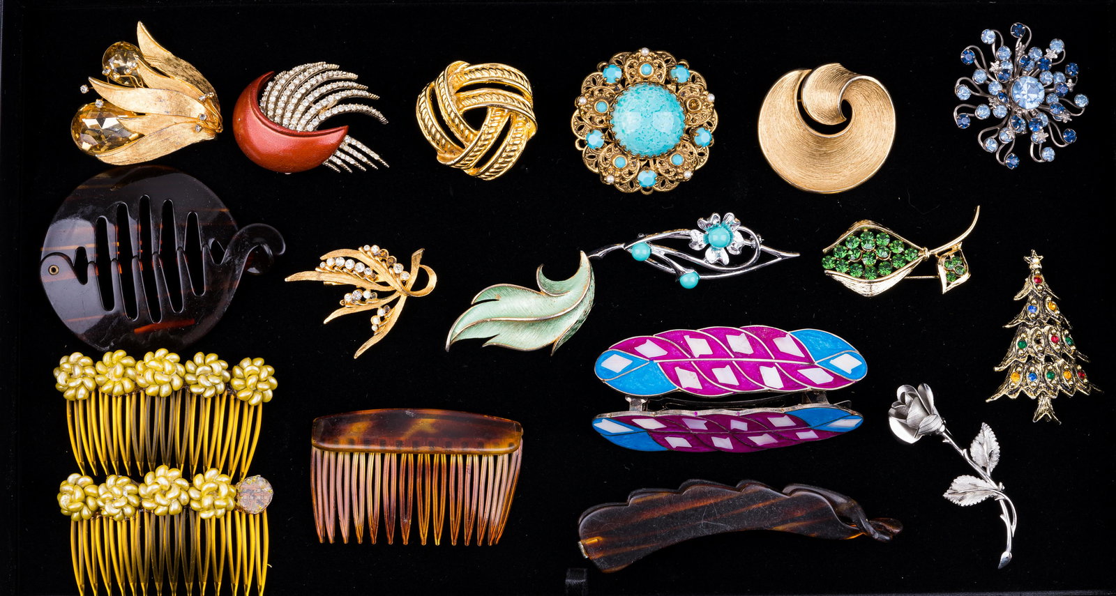 Costume Jewelry Brooches & Hair Clips: Lot of 12 brooches and seven hair clips. All stones test for glass. Names include Crown Trifari (gold tone swirl), Sarah Coventry, J.J., Pastelli.