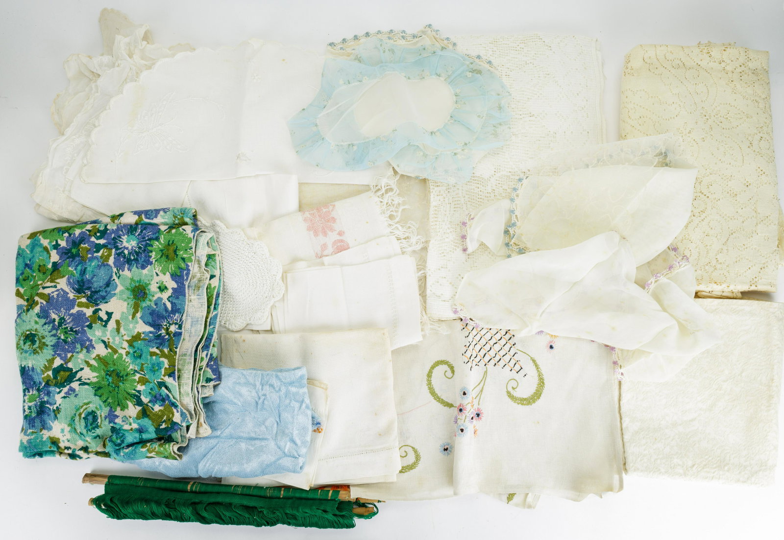 Vintage Linens, Table Cloths & More: Lot of 40 linens including 36 pieces and four table cloths. Some discoloration.