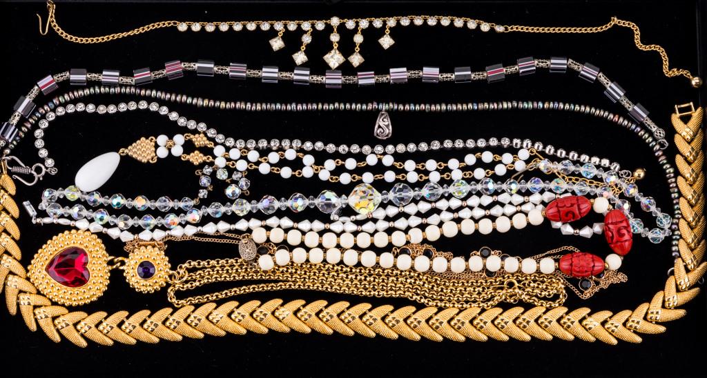 Costume Jewelry Necklaces: Vintage costume jewelry includes necklaces, some with names Coro, Ciner, Sarah, Trifari.