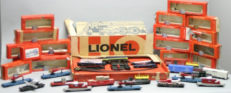 HO Lionel Train Lot: 5745- Steam freight set c and o; 3) 0319- Operating helicopter car; 0870- Maintenance car with generator; 0800-1- Road plane carrier with plane; 0366- Operating milk car, damage to wheels; 0805-1 Seab