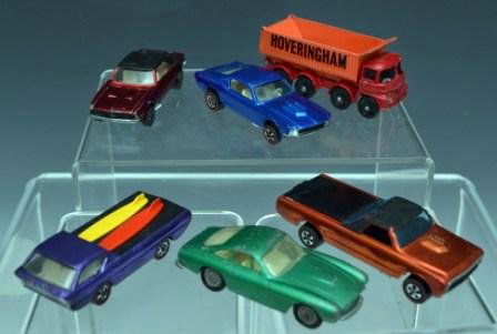 Hot Wheels & Matchbox Cars: Deora with original boards 1967, Custom Fleet side 1967, Custom Camaro 1967, Custom Mustang 1958, Hoveringraham Tipper, and Matchbox Ferrari Berlinetta, all show light to moderate playwear