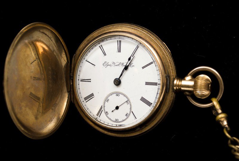 Elgin 18s Hunters Case Pocket Watch: Elgin 18s hunters case pocket watch with chain, movement #5102241, case #430886; with original label inside case stating "Made of two plates of solid 14k gold with a plate of hard composition between 
