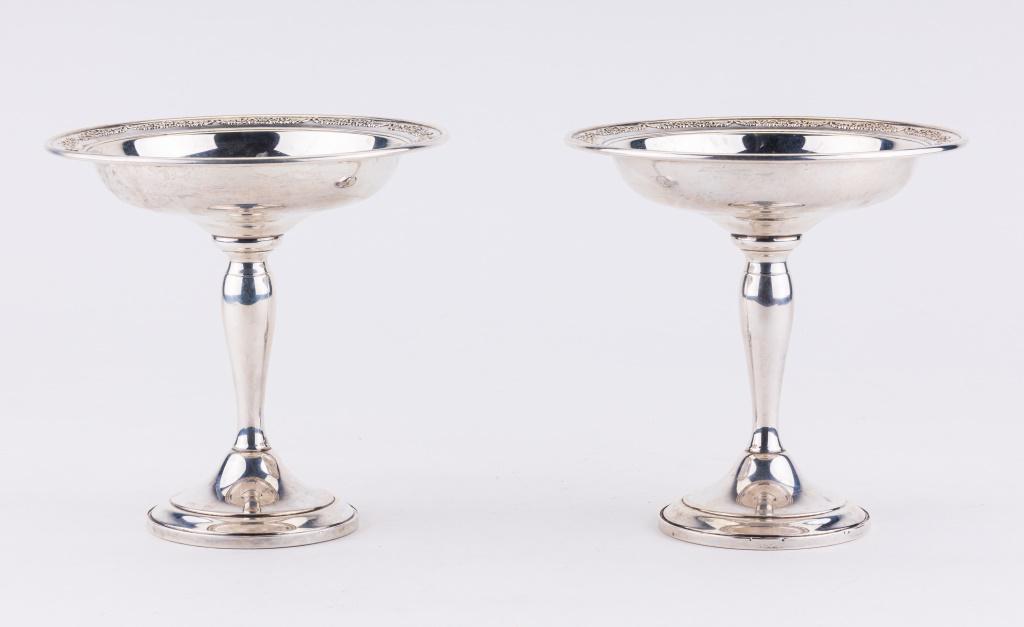 Gorham Sterling Weighted Candy Dishes Pair: Pair of Gorham sterling weighted candy dishes, each measuring approx 6.25" H x 6.25" dia. One is in very good condition and one in good condition (has small dents on base).