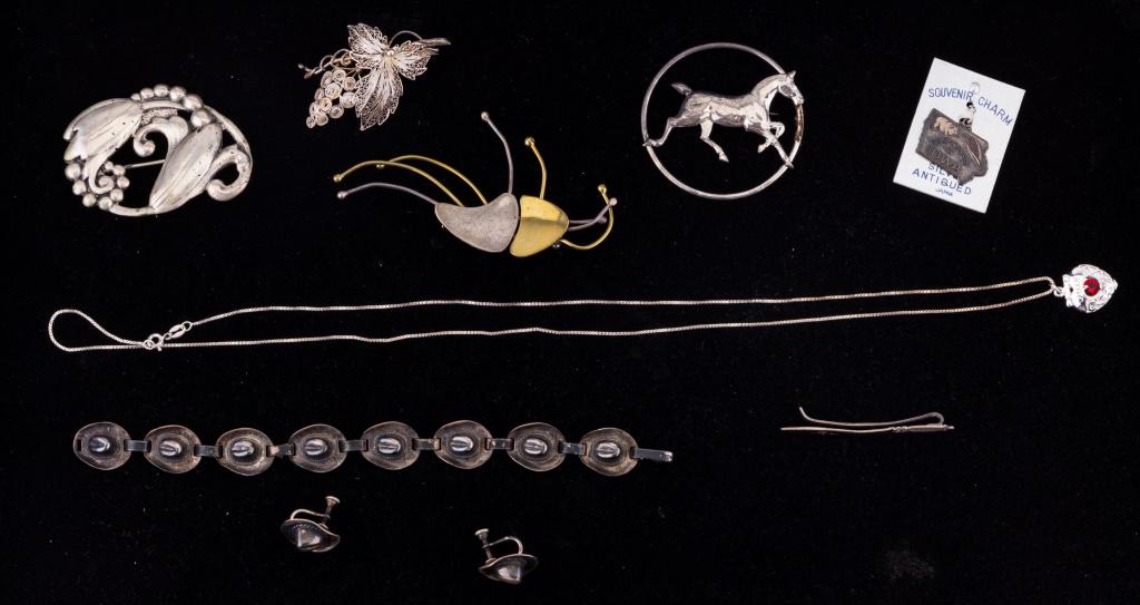 Vintage Sterling Silver & 800 Silver Jewelry: Sterling silver and some 800 silver jewelry includes four brooches (one silver and gold over silver is marked TH-58-Mex92), cowboy hat screw back earrings and bracelet (bracelet approx 6.5" L), Iowa s