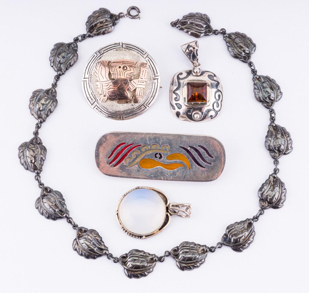 Sterling Silver Brooches, Pendants, Necklaces: Lot of five pieces of sterling silver jewelry including leaf choker necklace, amber pendant, moonstone pendant, Mexican elongated brooch marked "Mexico TS-92 and one more brooch.