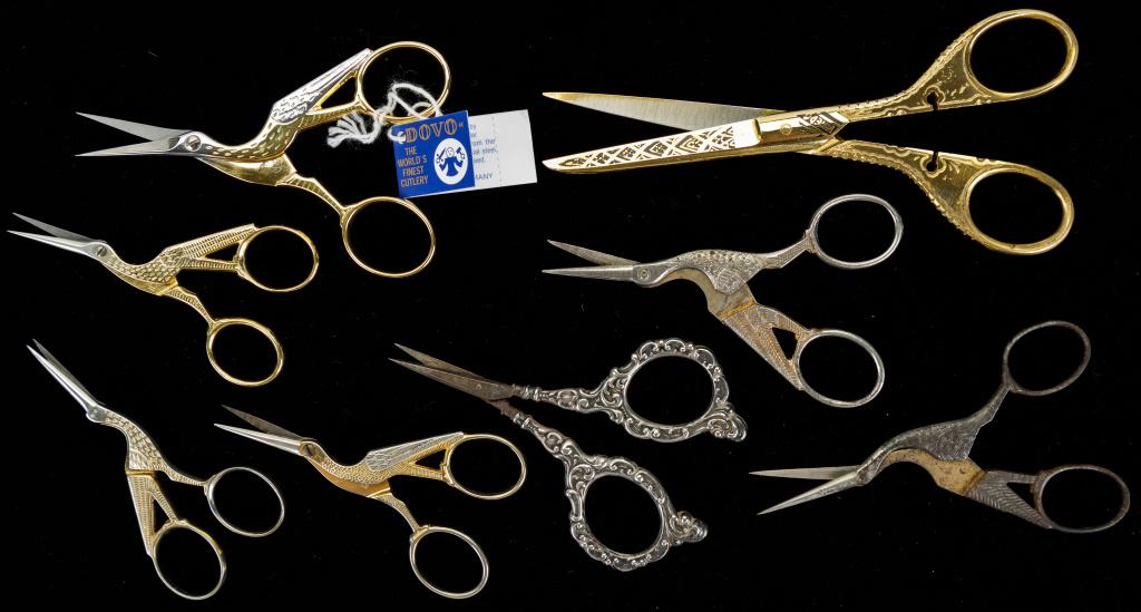 Crane Stork Embroidery Thread Scissors: Eight pairs of scissors / shears including a pair marked Germany with sterling silver handles a pair of larger gold tone as well as six crane or stork sewing scissors marked Soligen Germany, Italy, Ho