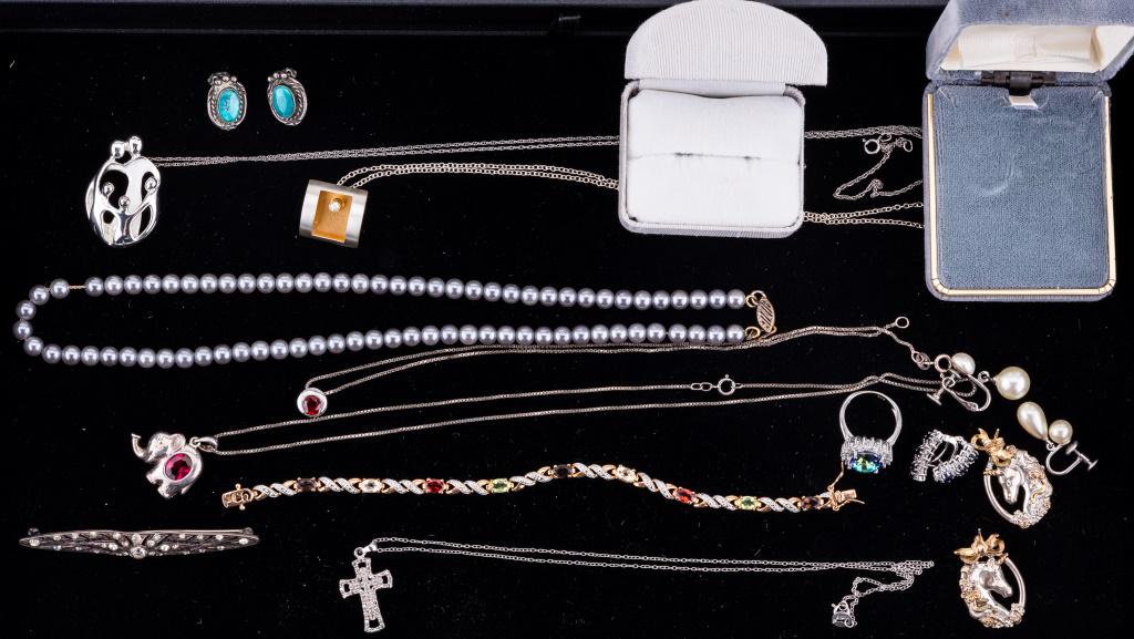 Sterling Diamond & Semi Precious Jewelry: Diamond cross necklace, multi colored bracelet with semi precious stones, faux pearl necklace and earrings, ruby elephant necklace, circular necklace with garnet, blue sapphire earrings with Omega bac
