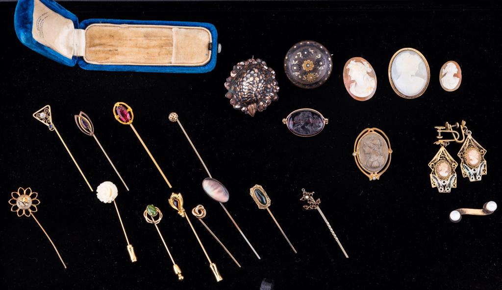 Victorian Jewelry, Cameos & Stick Pins: Lot includes 12 stick pins with a stick pin box, bog oak shield (with hinged C clasp), mother of pearl with C clasp, lava cameo, five shell cameos, one glass cameo, chick head brooch (hinged C clasp).