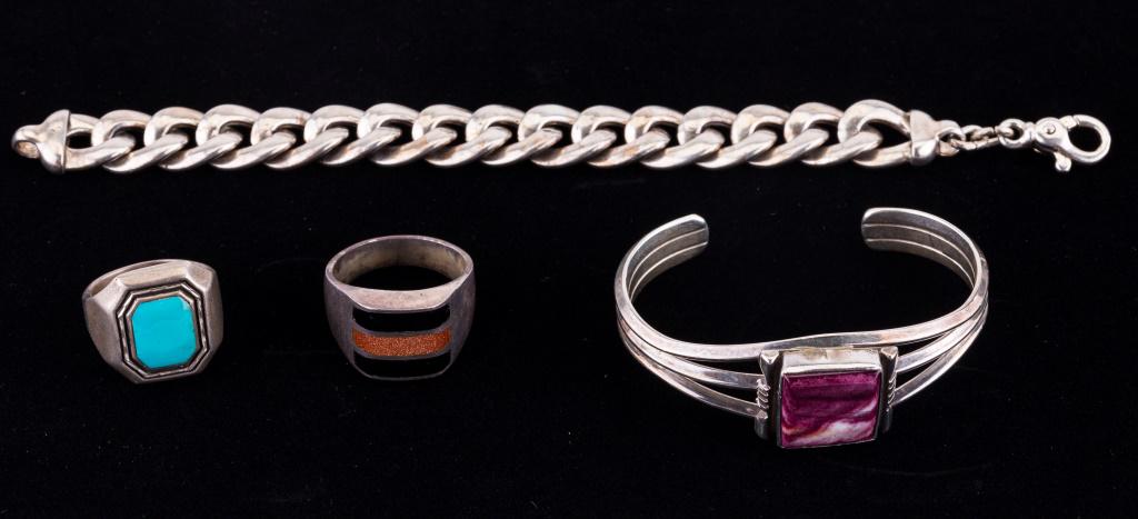 Early Sterling Silver Bracelets & Rings: Four pieces of early sterling silver jewelry including cuff bracelet with possible fluorite, sterling chain bracelet, turquoise ring (size 10) and a gold and black ring signed Mexico (size 12.5).