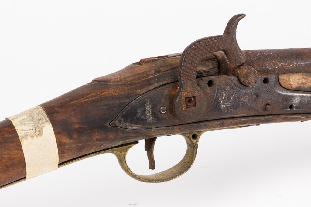 British Tower "Brown Bess" Perc. Conversion Musket: British Tower pattern 1839 percussion conversion smoothbore musket. Lock has an engraved crown with "GR" underneath it, along with "Tower" on the back of the lock. Has a rounded brass piece screwed in