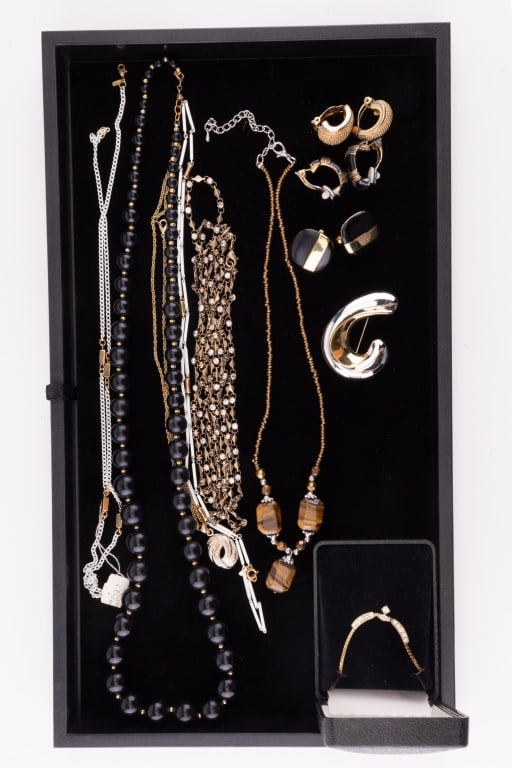 Monet & More Costume Jewelry: Lot of 10 pieces of jewelry including 3 pairs of clip earrings (one Monet), Monet brooch, two white Monet necklaces, tiger eye necklace, black beaded Monet necklace and more. See photos.