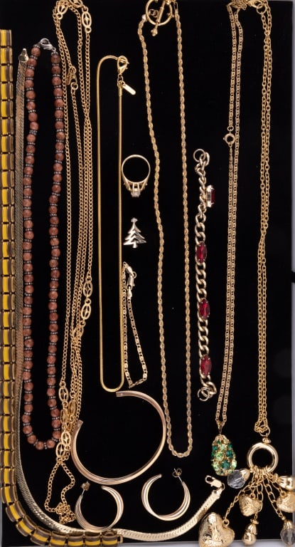 Gold Tone Costume Jewelry Necklaces & More: Lot of gold tone costume jewelry includes a matching Sarah Coventry (SC) bracelet and earrings. There is also a Monet chain. All stones test for glass.