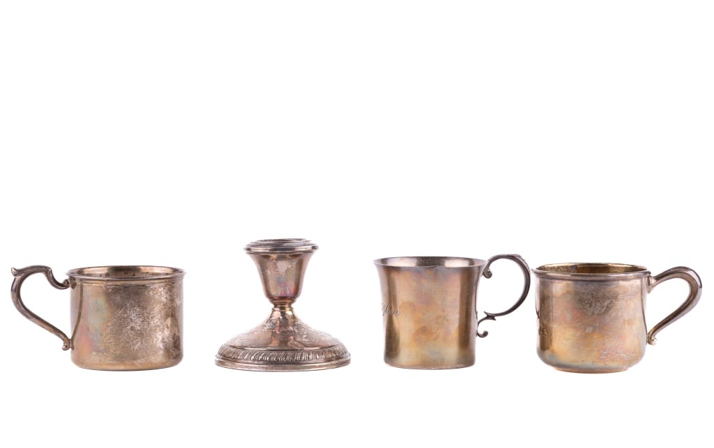 Sterling Silver Cups & Candle Stick: Three sterling silver cups including one with internal gold flash signed WEB; monogrammed marked "Exemplar John Coney Circa 1700"; and an S. Kirk & Son. There is also sterling weighted candle stick (a