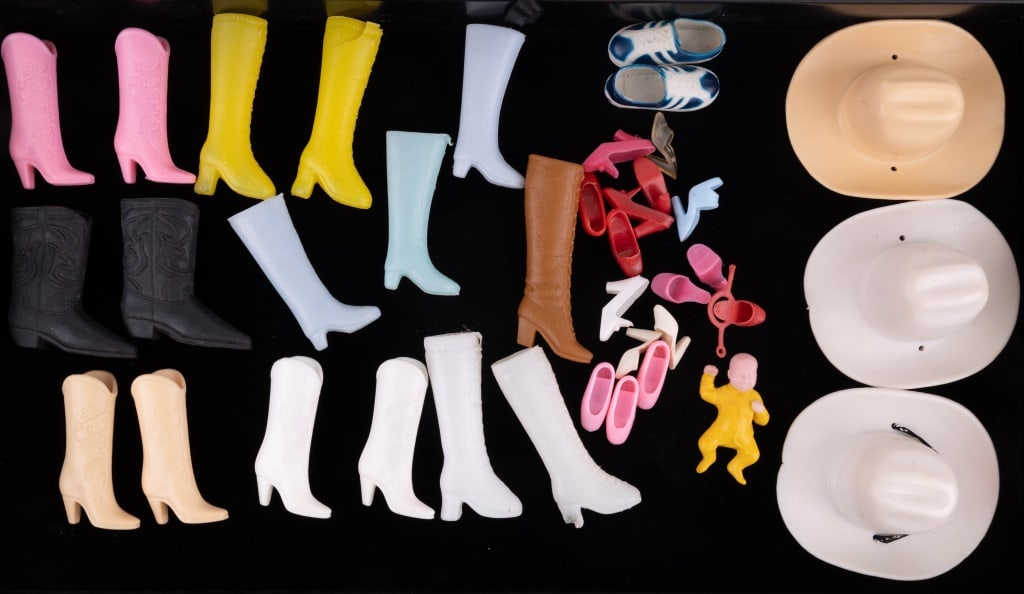 Barbie Vintage Cowboy Hats, Boots & Shoes: Large lot of vintage Barbie boots, cowboy hats, heels and more. Some boots are inscribed "Barbie" on the side.