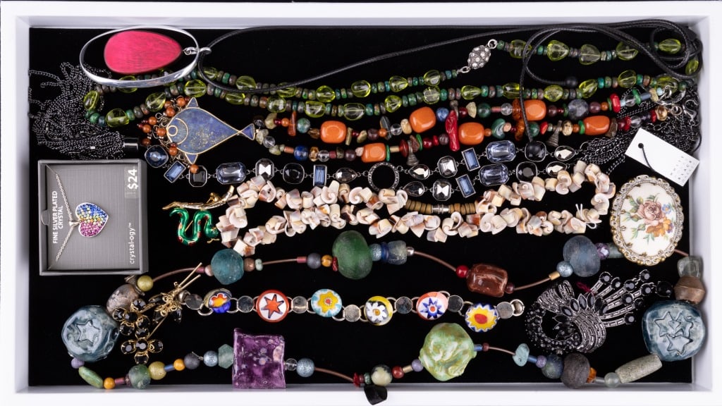 Vintage Stone & Estate Jewelry: Lapis lazuli fish necklace with various stone, carnelian and coral. There is also a green glass necklace with black opal style spacers and a necklace with clay, metal and sea glass as well as brooches