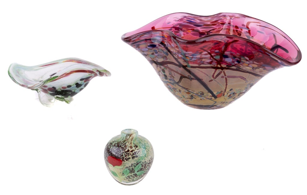 Gerletti, Orient d Flume & Other Art Glass: Orient d Flume small green spatter look glass vase paperweight 1982 May I P (approx 4") and Oulu Glass green bowl and 1997 ruby colored John Gerletti art glass bowl (approx 13" L x 5.5" H).