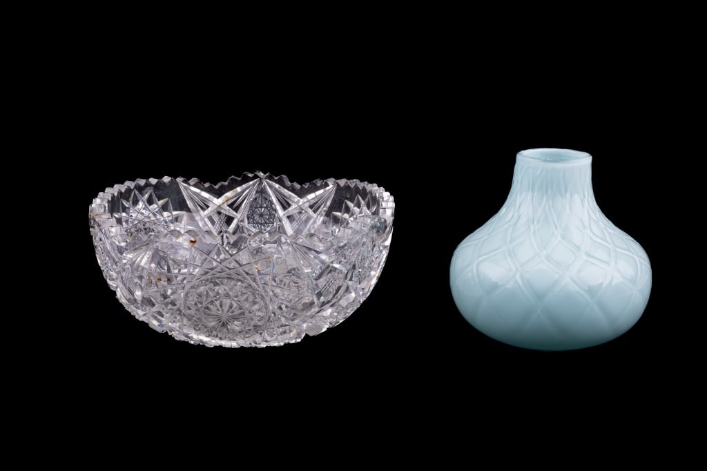 Cut Glass Bowl & Teal Hand Blown Vase: 8" dia cut glass bowl and light teal colored overlay hand blown vase (approx 5" H). There is a small rim chip on the crystal bowl.