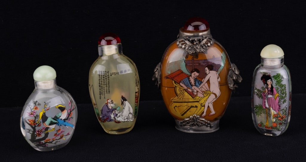 Chinese Glass Painted Snuff Bottles: Four Chinese glass painted snuff bottles. Largest measures approx 3 5/8" (missing spoon, loose cap, erotic scene).