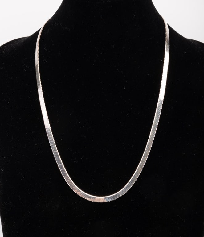 Large Heavy Sterling Herringbone Chain (23"): Sterling Herringbone chain measuring approx. 23" long and approx 5mm (3/8") in width. Chain is marked 925 Milor. Chain is in overall good condition, minimal tarnish, could be cleaned.