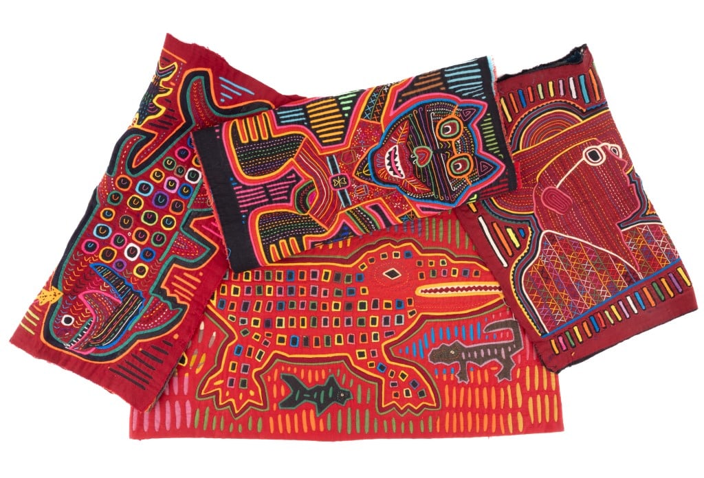 Vintage Cuna Panama Indian Molas (4): Four 1960s molas, hand made artwork on fabric made by the Kuna / Cuna Indians of the San Blas islands of Panama in Central America. The four molas with designs of a jazz singer (unknown), fishermen in