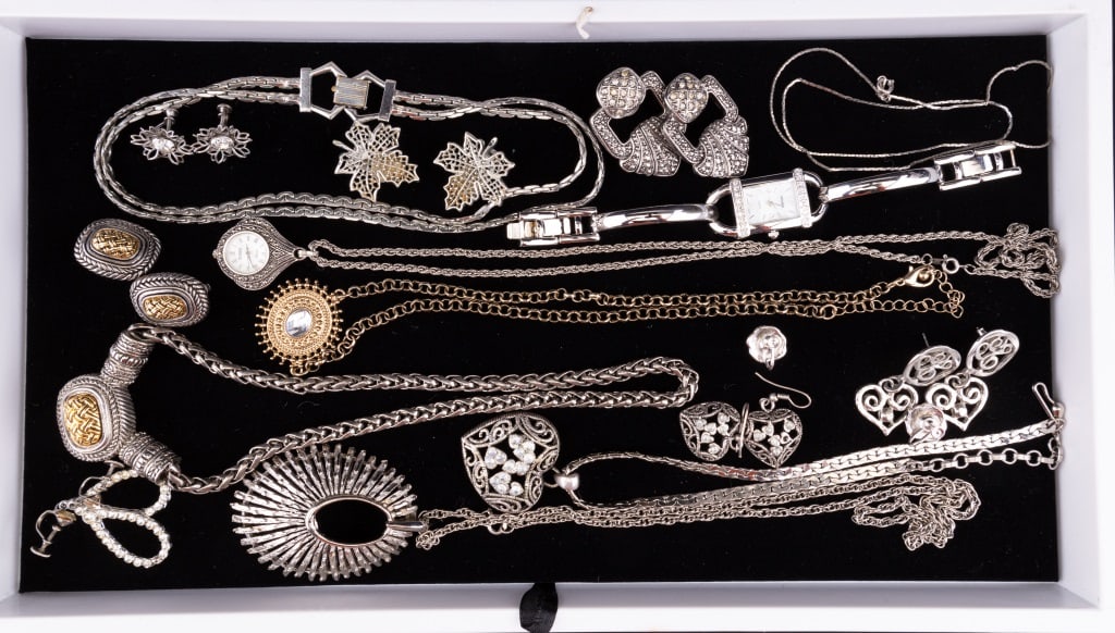 Silver Tone Jewelry: Group of silver tone jewelry including 6 necklaces, 8 pairs of earrings and two watches (Gitano pendant, Gruen wrist).