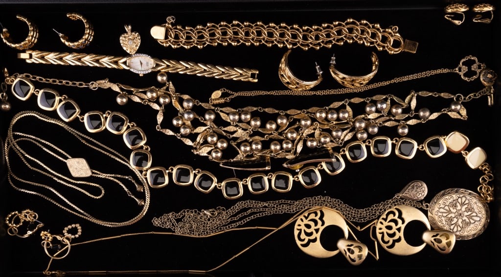 Gold Tone Jewelry: Gold tone jewelry including 6necklaces, 2 bracelets (one Citizen watch), 5 pairs of earrings and a pendant.