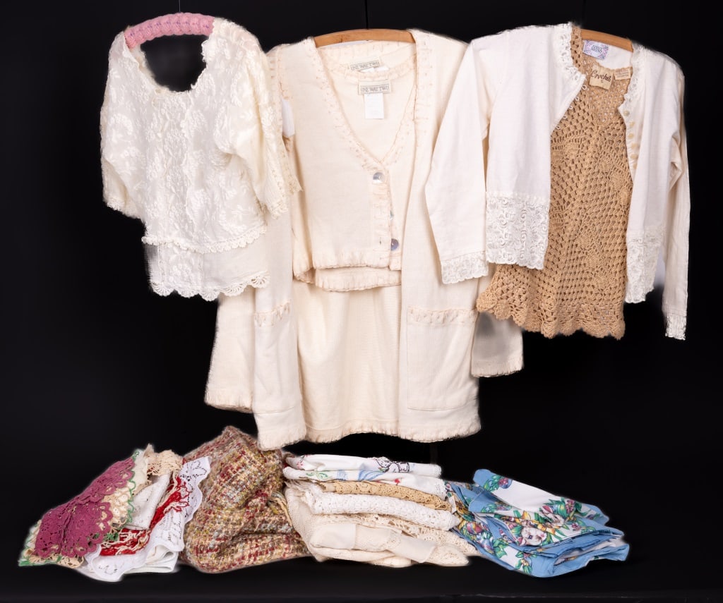 Vintage Doilies, Linens & Garments: Vintage linens and garments including 15 lace and misc doilies, 5 lace and knitted table runners (various sizes small to large), Easter table cloth set with 4 place mats and 8 napkins, large lace roun