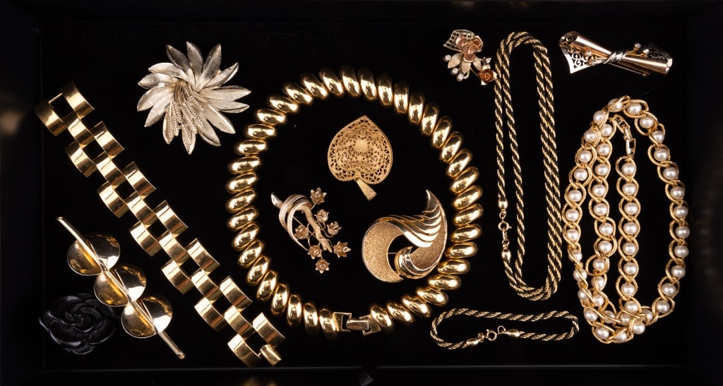 Name Brand Costume Jewelry: Name brand costume jewelry featuring a 7 1/2" Napier rectangle links bracelet, a 16 1/2" Napier gold tone choker necklace, a 24" Napier faux pearl and gold tone necklace, a 2" (including bale) Miriam 