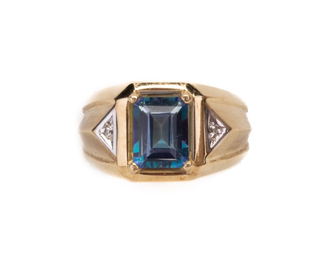 10K Gold Men's Ring: A 10K gold men's size 10 blue topaz and diamond ring. 3.02 DWT