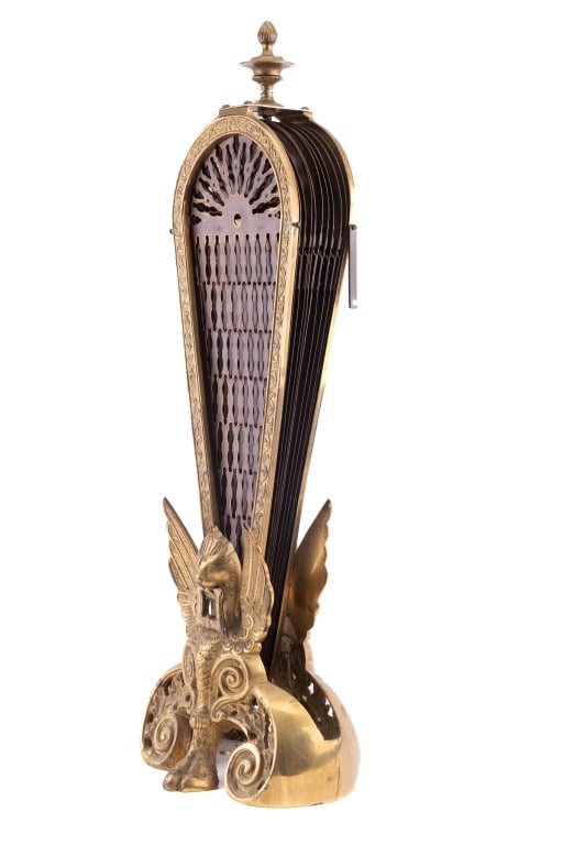 Peacock Style Brass Fireplace Screen: Early 20th C Peacock style fan measures approx 25.5" H x 38" W x 4D while open. Has a griffin brass base design.`