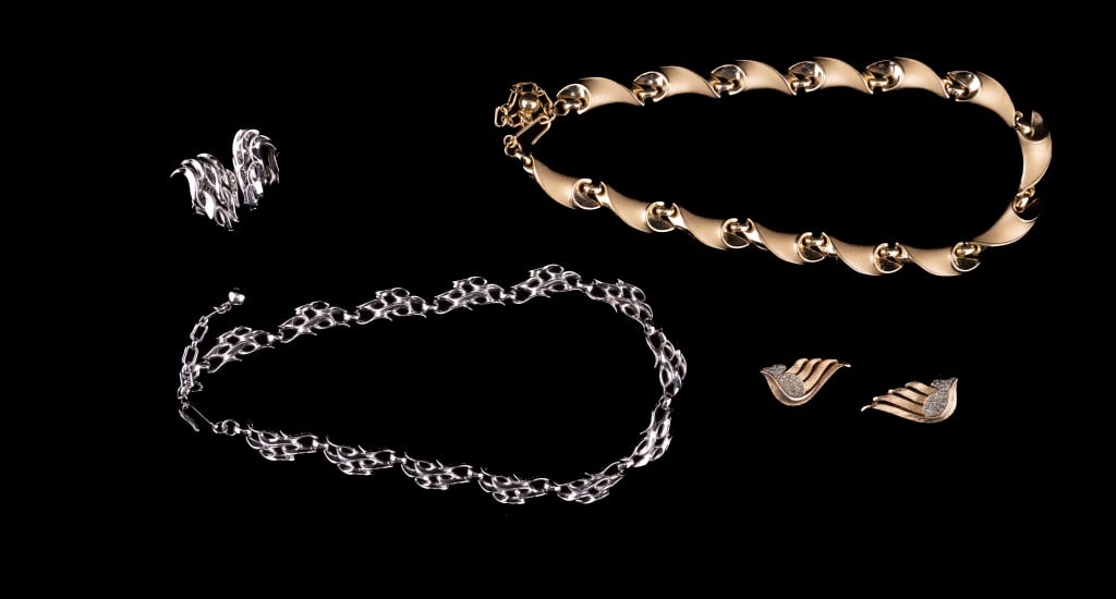 Trifari Vintage Jewelry: Includes 2 Trifari sets, one gold tone and one silver tone and also includes vintage Trifari and stone clips.