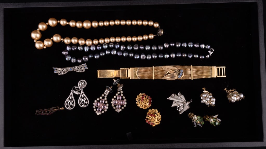 Sterling Pearl & Estate Jewelry: Various pearl style sterling clasp art deco bow brooch, Victorian garnet brooch, "Consul" Swiss circa 1940's antique hidden watch retro bracelet, two pair Trifari, Vendome earrings and more.