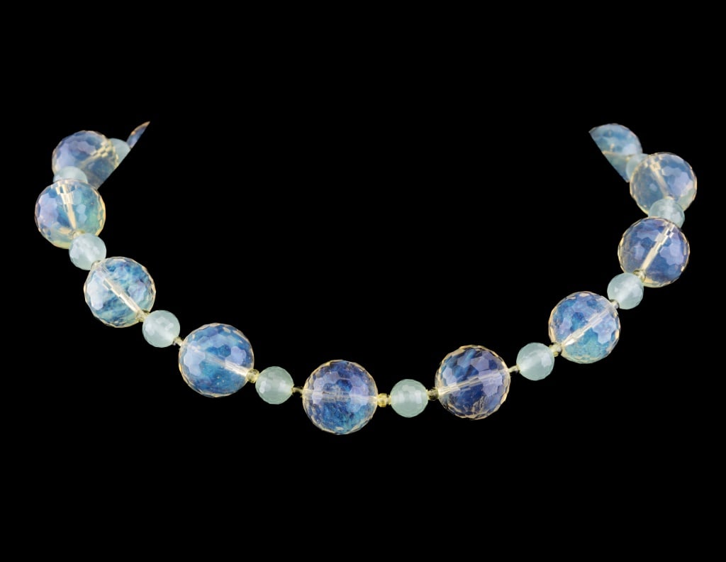 Sterling and Lemon Quartz Necklace: Sterling and peridot clasp on a necklace with large faceted lemon quartz style beads between jade style beads. There are also small peridot beads on the necklace.