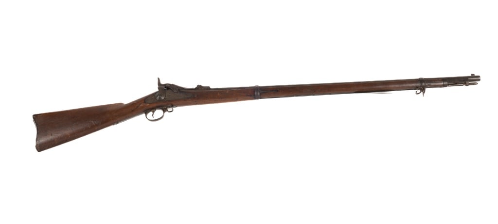 1884 U.S. Springfield Armory Trapdoor Rifle: U.S. Springfield Armory 1884 Trapdoor Rifle marked US A 10 61 on butt end. Model #1884, serial number 545669 on top. 45-70 Caliber Carbine. Marked "U.S. Springfield with eagle and shield. Appears to b
