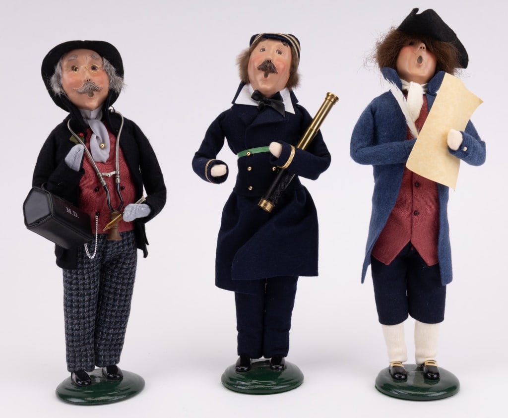 Historical Byer's Choice Figurines: Set of 3 historical Byer's Choice figurines including doctor, ships's captain, and Ben Franklin. Figurines come in original boxes and measure approximately 13" tall.