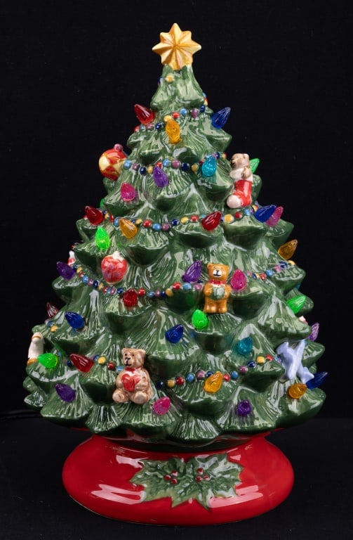 Radko Porcelain Light Up Christmas Tree: Christopher Radco Christmas Tree with two pieces, base is separate and includes a light bulb. Approx 14" H. Untested.