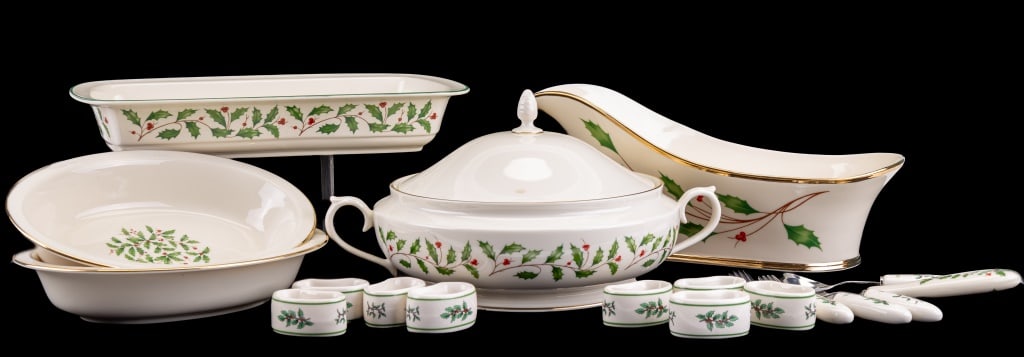 Lenox "Holiday" Pattern Serving Hollow Ware: Gold rimmed Holiday Pattern with holly and berries. Dishes include 13.75" rectangle dish, two 9.75" open vegetable, 13" covered vegetable, and a sleigh shaped / porringer 13.5" L, 8 napkin rings, 5 se