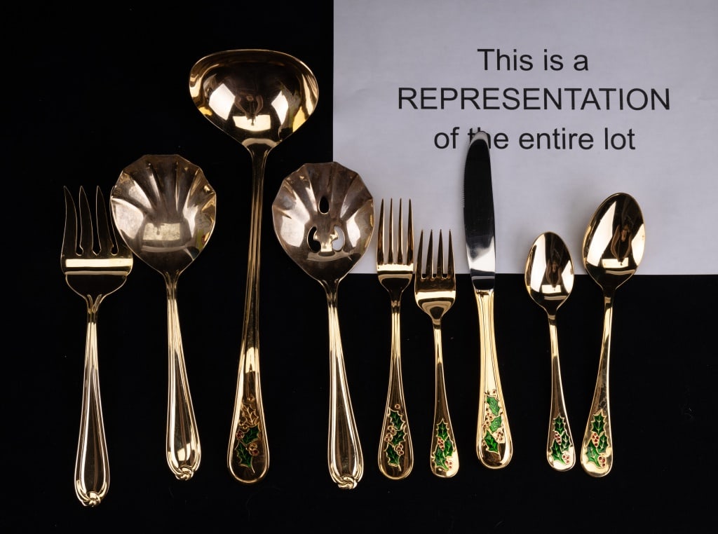 Retroneu Stainless 24K Gold Electroplate Flatware: Holiday pattern gold plated flatware includes 20 pieces of each soup spoon, regular spoon, dinner fork, salad fork, knife. Also 4 serving pieces. 104 pieces with some original paperwork. Christmas.