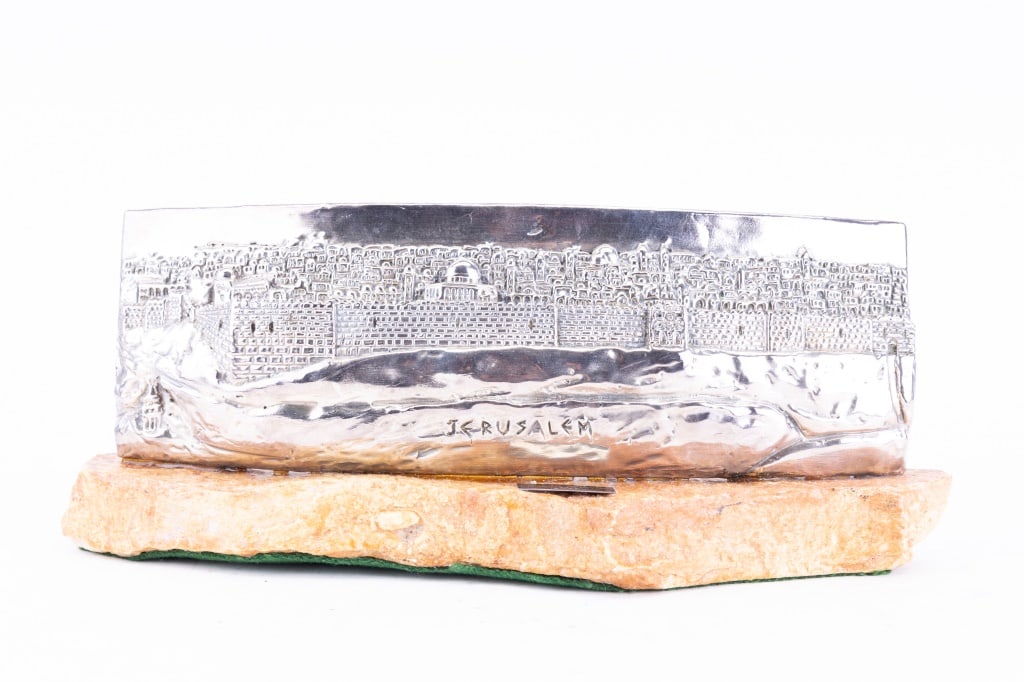 Jerusalem Weighted Silver City Scape Sculpture: Weighted sterling silver on stone type base approx 14" W x 5.5" H, marked Sterling 925 Israel on side and have a front plaque Isaac Jeheskel.