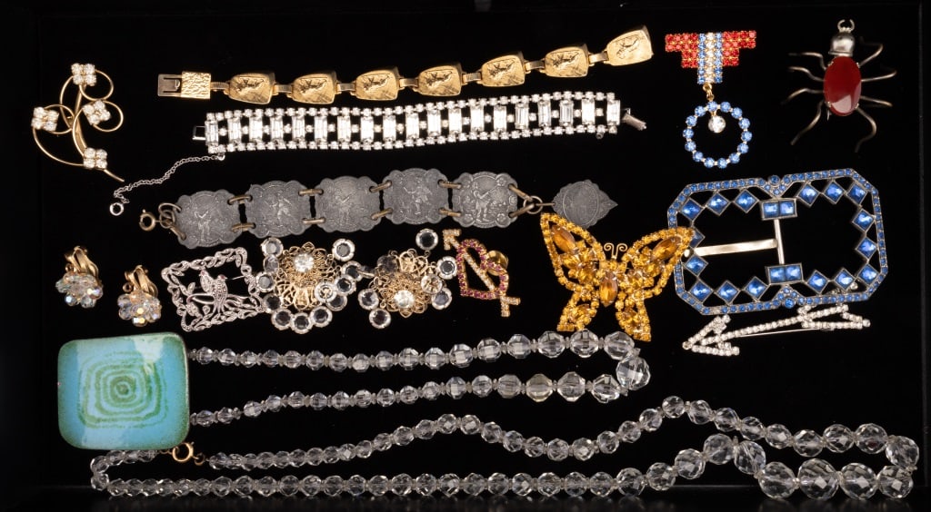 Vintage Estate Jewelry: Sampling includes several crystal necklaces, marcasite bird brooch, large yellow hue butterfly brooch and other brooches, bracelets, large buckle, earrings and more.