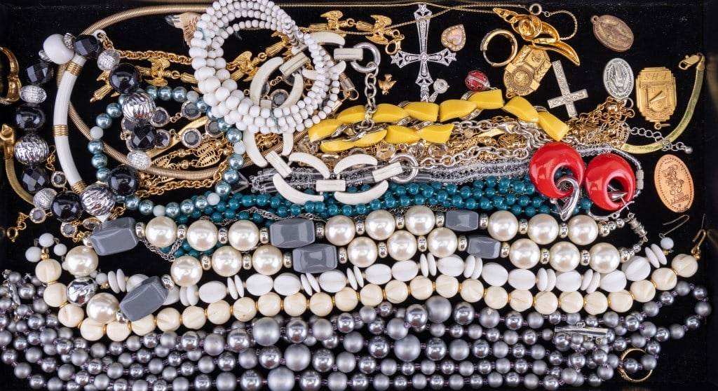 Vintage Jewelry Collection: Several necklaces including pearl type, lucite, gold tone, religious and more.